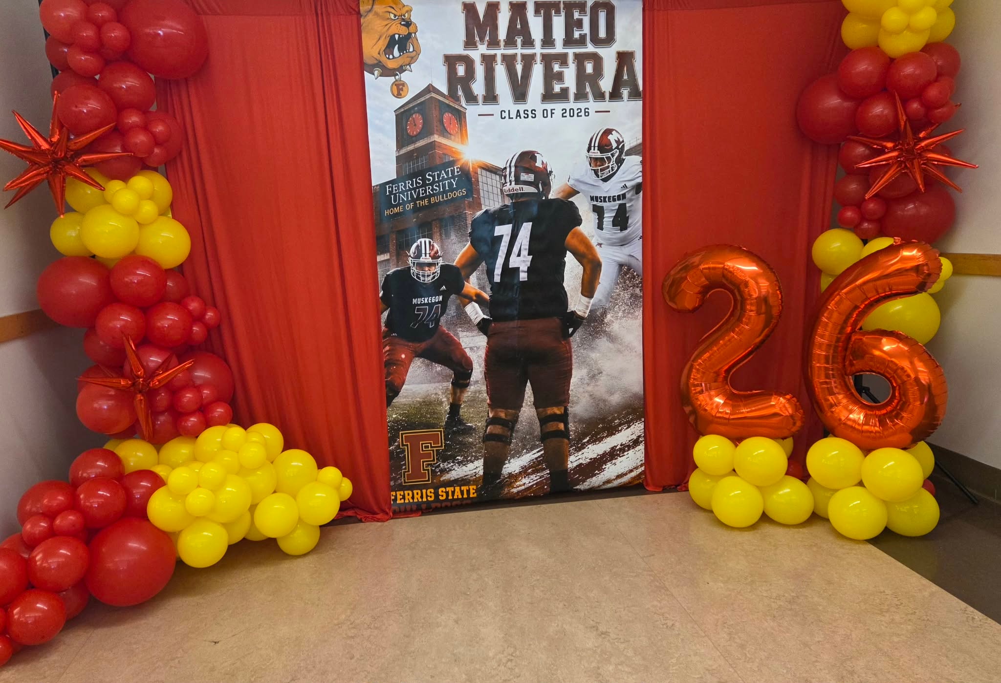 Mateo Rivera graduation balloon arch in red and gold