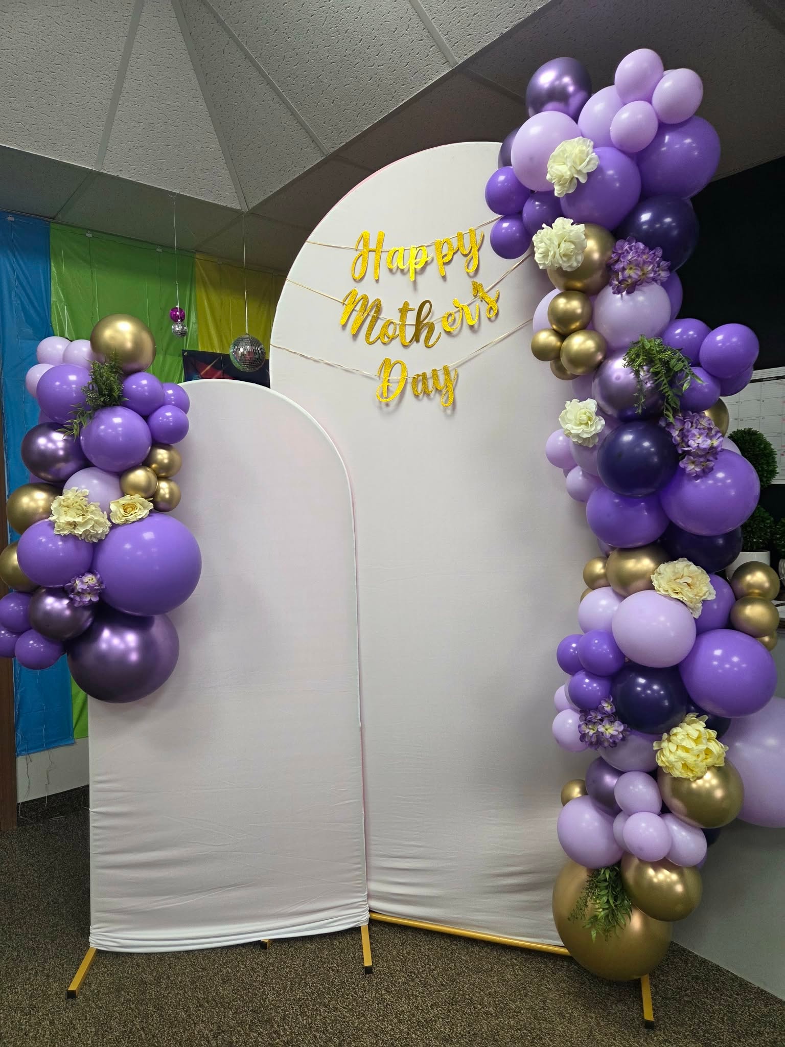 Purple and gold Mother's Day balloon garland