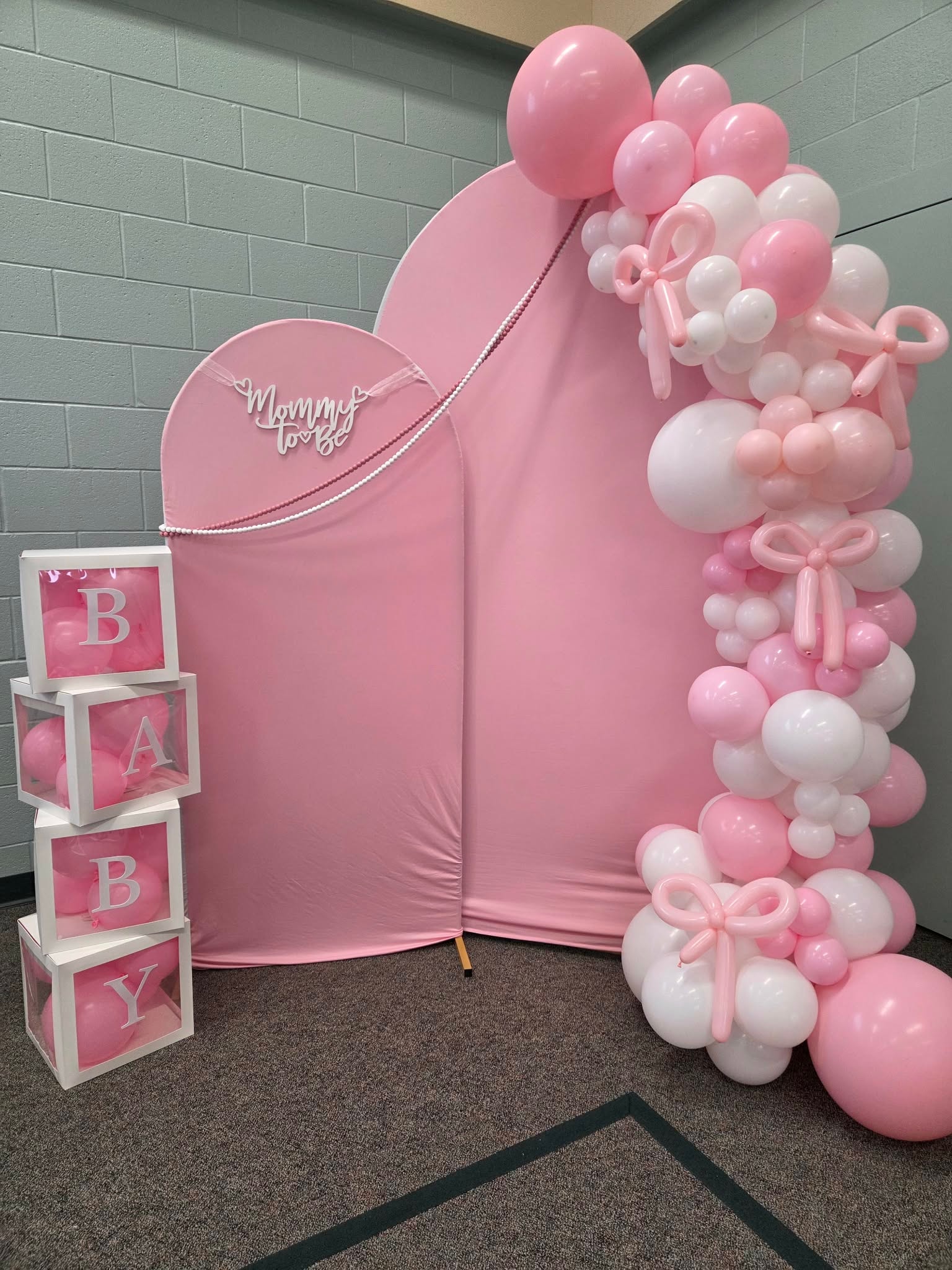 Pink Mommy to Be baby shower balloon backdrop